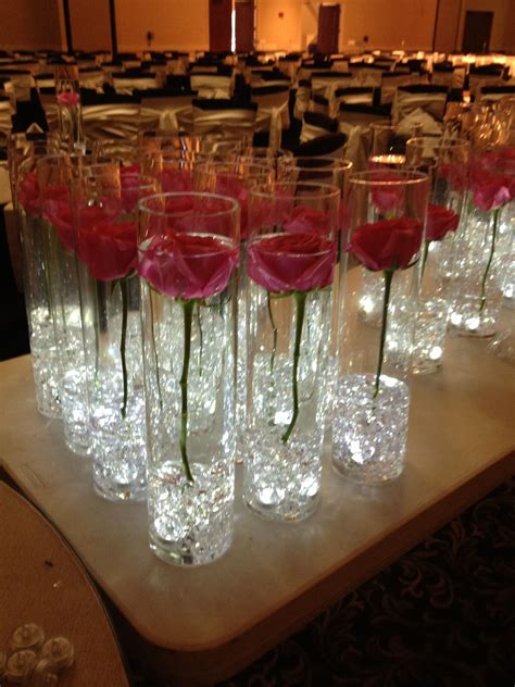 single rose in cylinder vase with submersable LEDS | Rose centerpieces wedding, Wedding ...