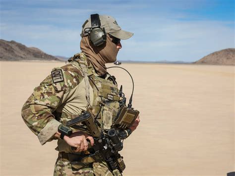 A RAAF Combat Controller conducts an Airfield Survey on a dry lake bed ...