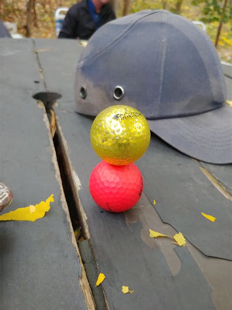 I Stacked Two Golf Balls Perfectly : r/mildlyinteresting