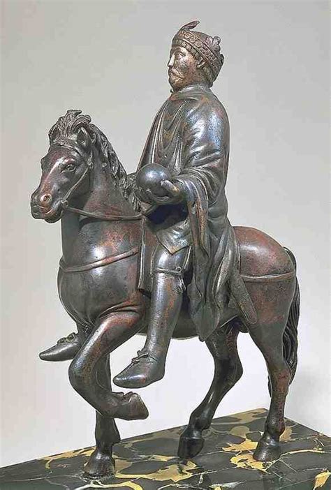 Statue of king Charlamange constructed around 9th century C.E. currently in the Louvre Museum ...