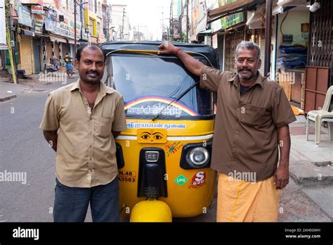 Portrait of smiling auto rickshaw drivers standing on street Trichy, Tamil Nadu, India Stock ...