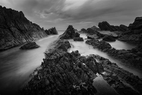 Grayscale photography of rock cliff HD wallpaper | Wallpaper Flare