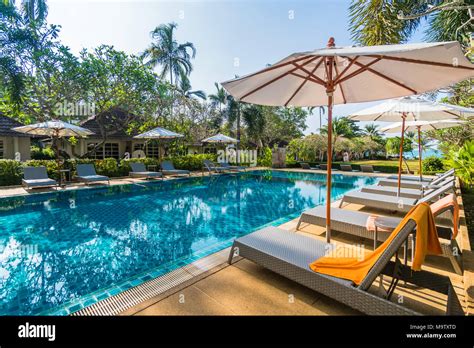 Beautiful luxury swimming pool in hotel resort Stock Photo - Alamy