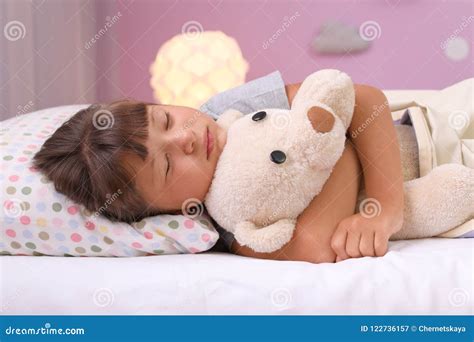 Little Girl Sleeping with Teddy Bear in Bed Stock Image - Image of ...