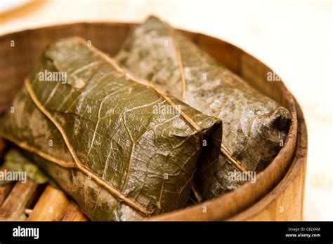 lotus leaf sticky rice chinese dim sum Stock Photo - Alamy