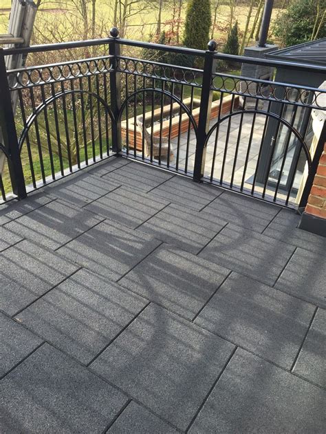 This Castleflex charcoal grey rubber promenade tile is easy to lay, great looking and durable ...