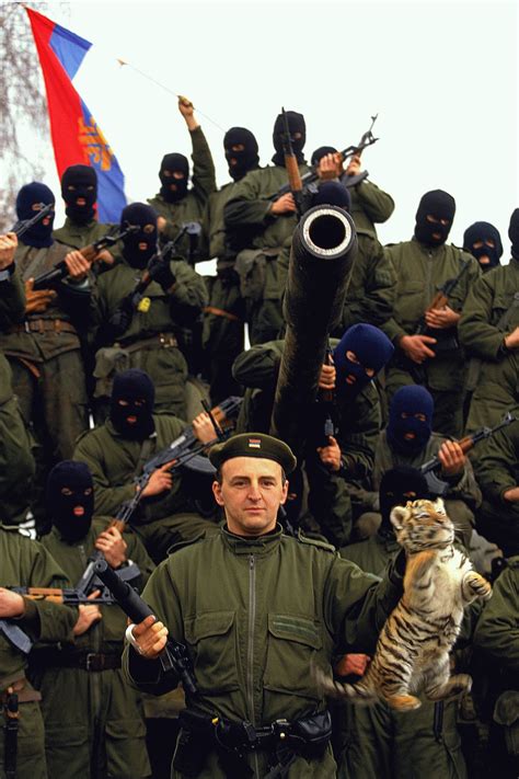 Zeljko Raznatovic poses with his Tigers, fall of 1991. Photo: Ron Haviv ...