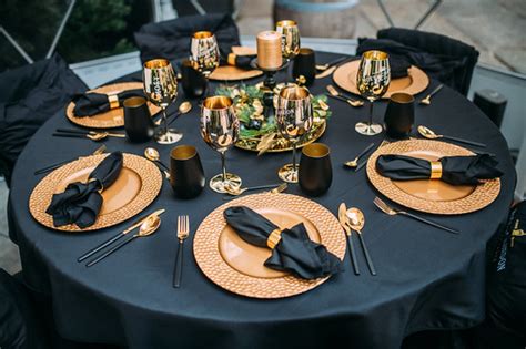 Dinner table with classy decoration. Gold on black | Flickr