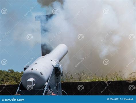 View of a Cannon Shooting Smoke Stock Image - Image of military, weapon: 234457317