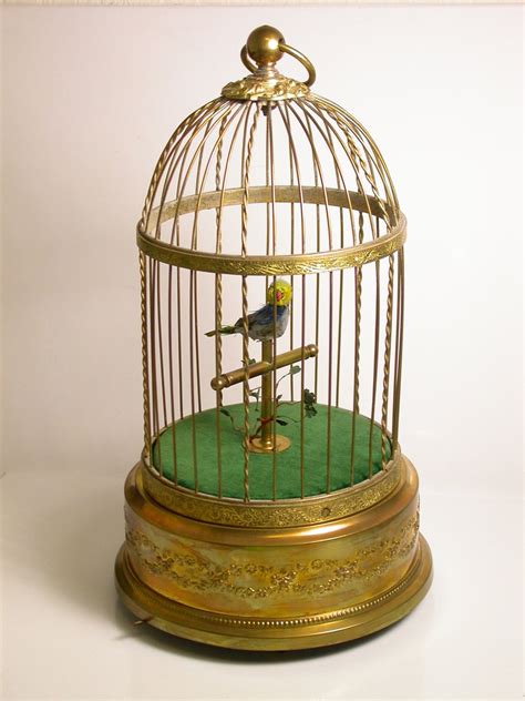 Items similar to Antique Mechanical Singing Bird in Cage Wind Up on Etsy