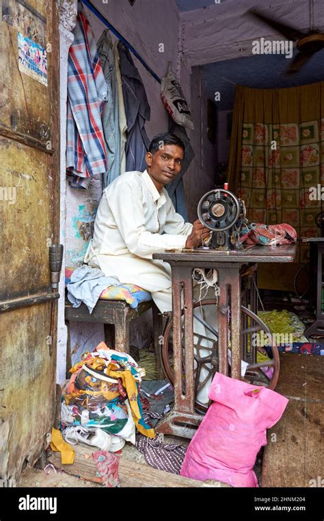 India Rajasthan Bundi. A man sewing clothes Stock Photo - Alamy