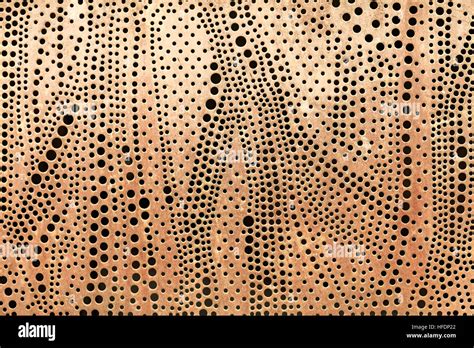 Perforated metal sheet abstract background Stock Photo - Alamy