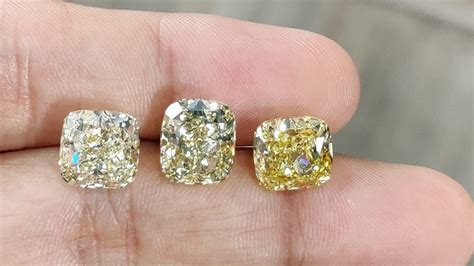 Live compare of natural light , fancy , intense yellow cushion diamonds - YouTube