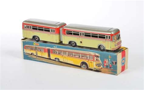 two toy buses are sitting on top of each other