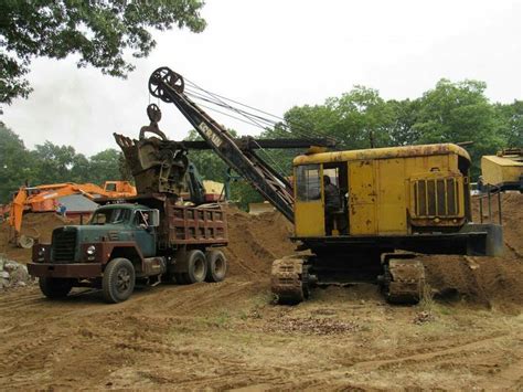 Lorain cable shovel loadin an old international dump | Heavy equipment ...