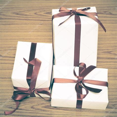 White gift boxes with ribbon Stock Photo by ©ammza12 78298726