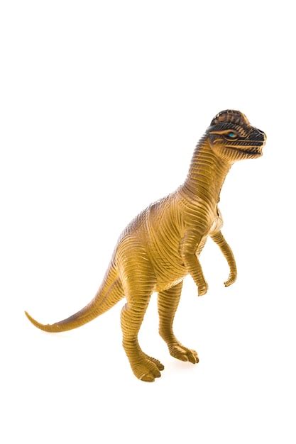 Dinosaur toy on white background Photo | Free Download