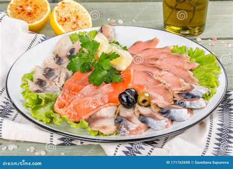 Fish Plate with Different Types of Smoked and Salted Fish Stock Photo - Image of mackerel, lunch ...