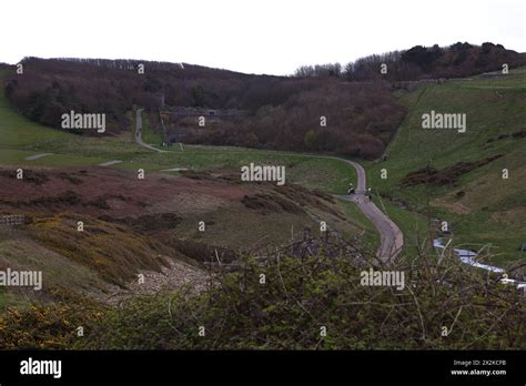 A long distance view of the Dunraven castle ruins and associated walled ...