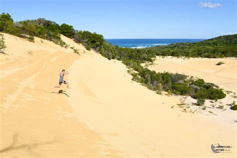 Jumping down a sand dune on Fraser Island - Adventure of a Lifetime