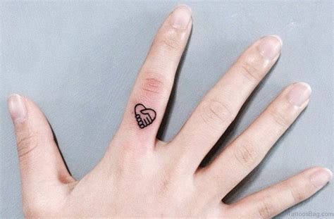 41 Awesome Love Heart Tattoos On Finger