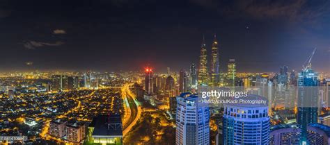 Malaysia, Kuala Lumpur, elevated view of skyline at night, showing... | Kuala lumpur, Skyline ...