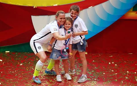 Of kisses, hugs and selfies: Family time for US players after World Cup win - Rediff Sports