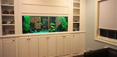 built in shelves idea | Fish tank wall, Built in shelves living room ...