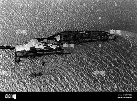 A vertical view of the wreckage of the USS UTAH (AG-16), which is now part of the USS UTAH ...