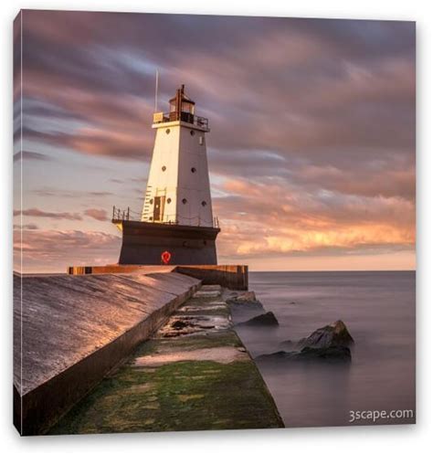 Ludington North Breakwater Light at Dawn Canvas Print by Adam Romanowicz