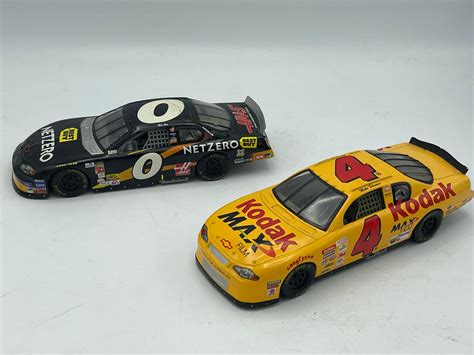 Lot - Lot of 2 Diecast 1/24 scale racing champions cars