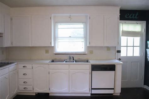 Painting oak cabinets white: An amazing transformation - Lovely Etc.