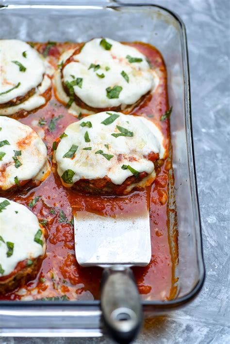 An oven-fry method creates this crispy Baked Eggplant Parmesan that rivals any fried version. An ...