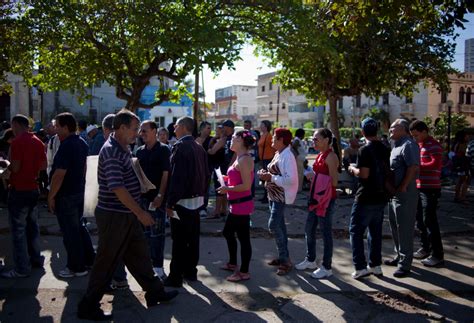 Cubans queue at travel agencies as eased travel restrictions takes effect | CTV News