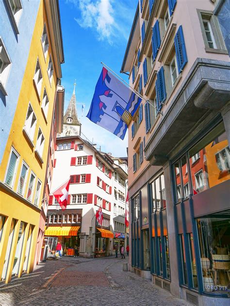 Colourful flags in the Altstadt of Zurich, Switzerland - read our ...