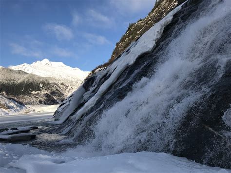 Nugget Falls cascades into Mendenhall Lake; Mendenhall Glacier in distance - William Arthur ...