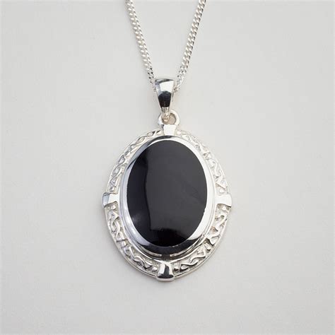 Heavy Sterling Silver oval shaped Celtic design pendant with solid silver back | Black Pearl Whitby