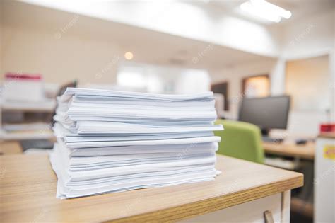 Premium Photo | Pile of a paper on office desk stacked.