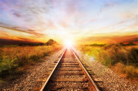 Train Tracks Sunset Stock Photos, Pictures & Royalty-Free Images - iStock