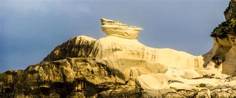 The Kapurpurawan rock formation is located on the rocky coast of Burgos, Ilocos Norte. It is ...