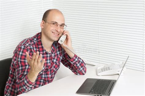 Happy Female Sitting at Desk in Bright Office Stock Image - Image of attractive, casual: 20170351