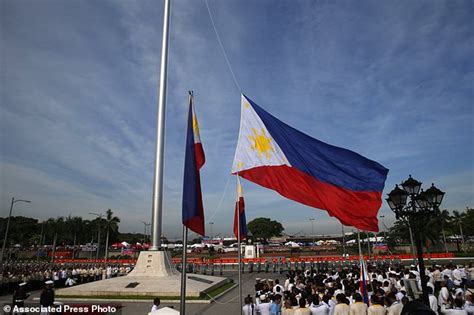 Philippine flag raised on Independence Day in war-torn city | Daily Mail Online