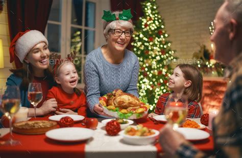 family celebrating Christmas Stock Photo by choreograph | PhotoDune