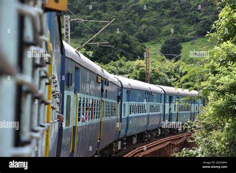 Indian Railways train Kirandul Passenger running through Araku Valley ...