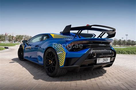 Rent a Blue Lamborghini Huracan STO, 2022 ID-04641, in Dubai - Renty.ae