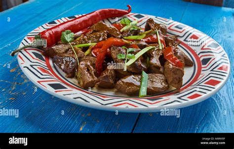 Mutton kidney roasted, Dungan cuisine Stock Photo - Alamy