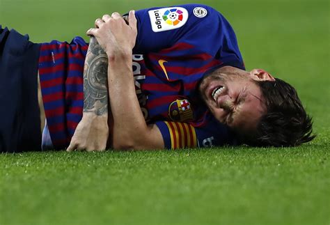 Messi breaks arm as Barcelona regains lead in La Liga