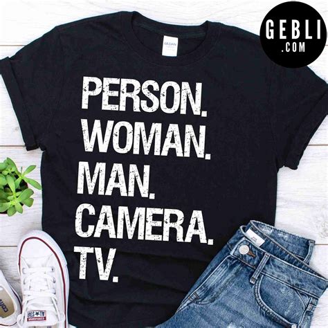 person woman man camera tv shirt - Gebli