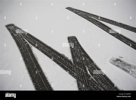 Tire tracks in snow Stock Photo - Alamy