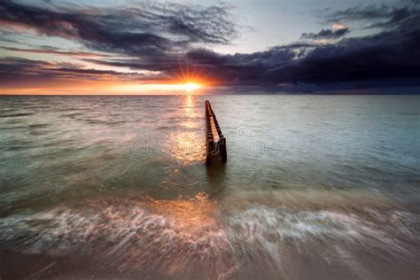 Sundown on Ijsselmeer Beach Stock Image - Image of sunrise, shore: 67662219